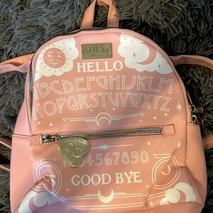 pink ouija mystifying oracle backback | hot topic |